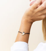 Pulsera Charm "Pisa fuerte y deja huella" astronauta