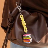 Llavero metálico "More books, please"