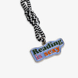Llavero metálico "Reading is sexy"